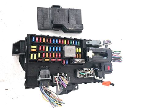 Where is the smart junction box located in a 2011 Lincoln MKS 